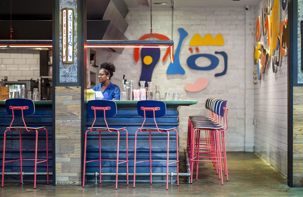 Reece Barstools in Custom Pink With Navy Seats at Recess