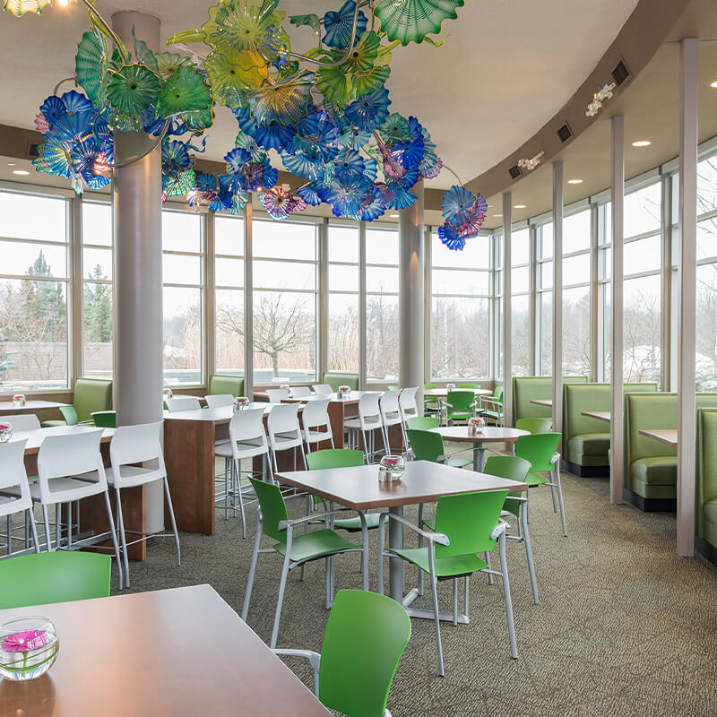 Spartan Pedestal Tables in cafe space.