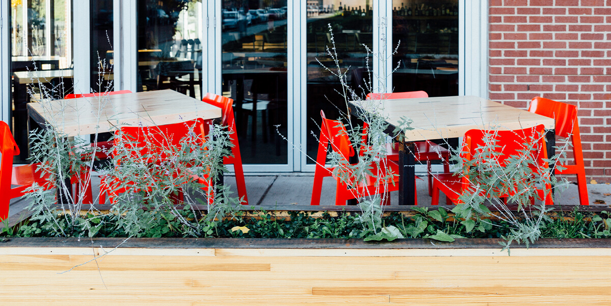 Red Sadie II Chairs on restaurant patio.