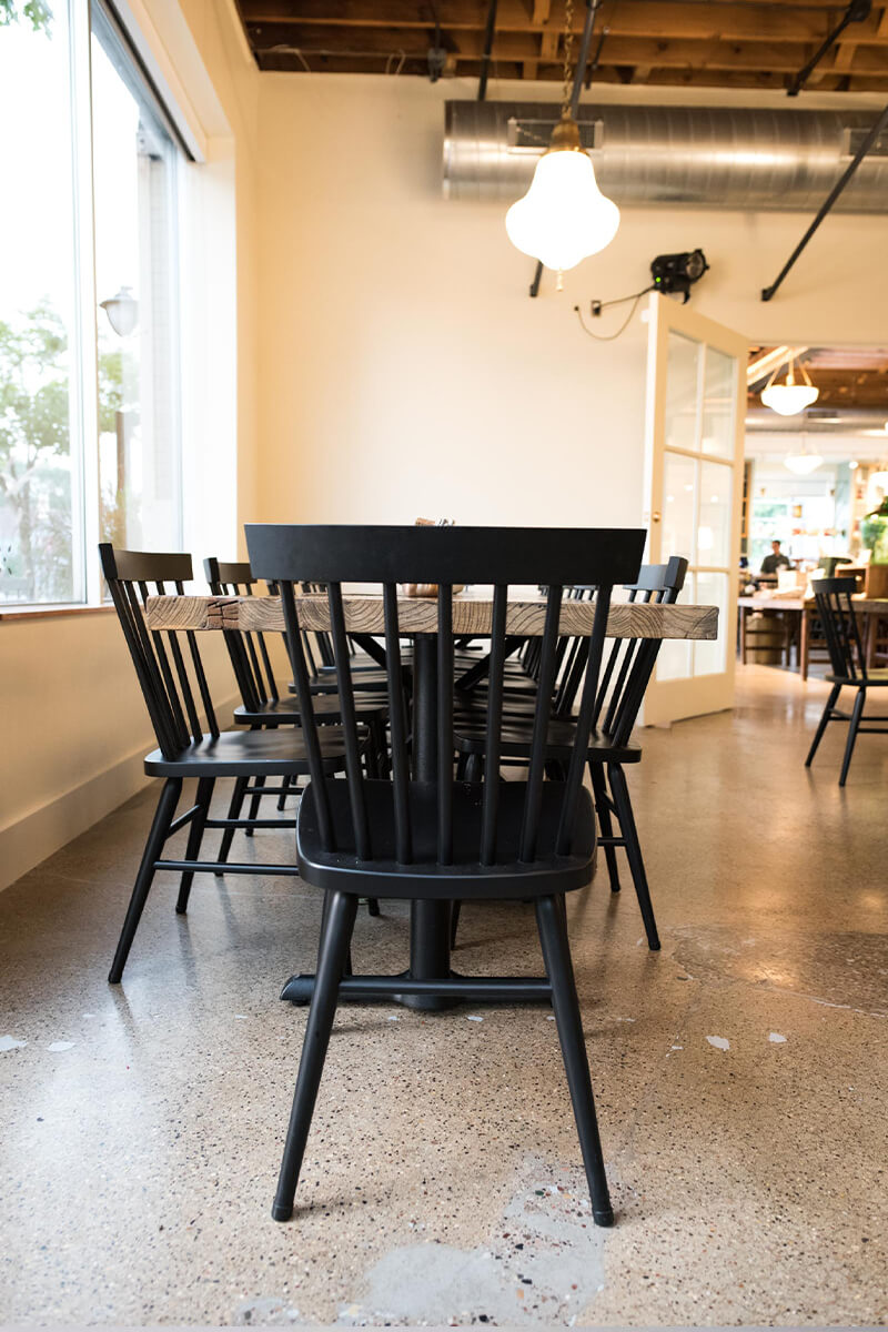 Harvest table with Black Wood Hugh Chairs.