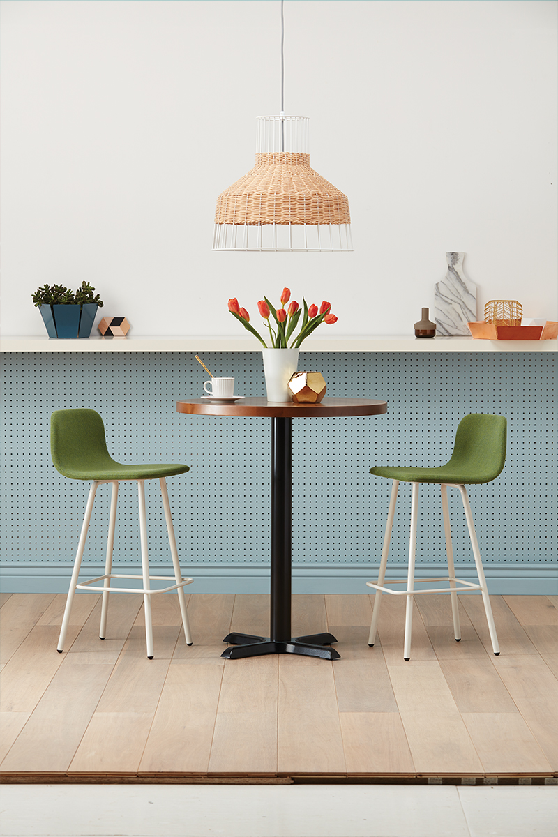 Pair of green upholstered Harper stools.