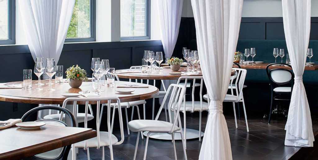 White Leo Chairs in restaurant.