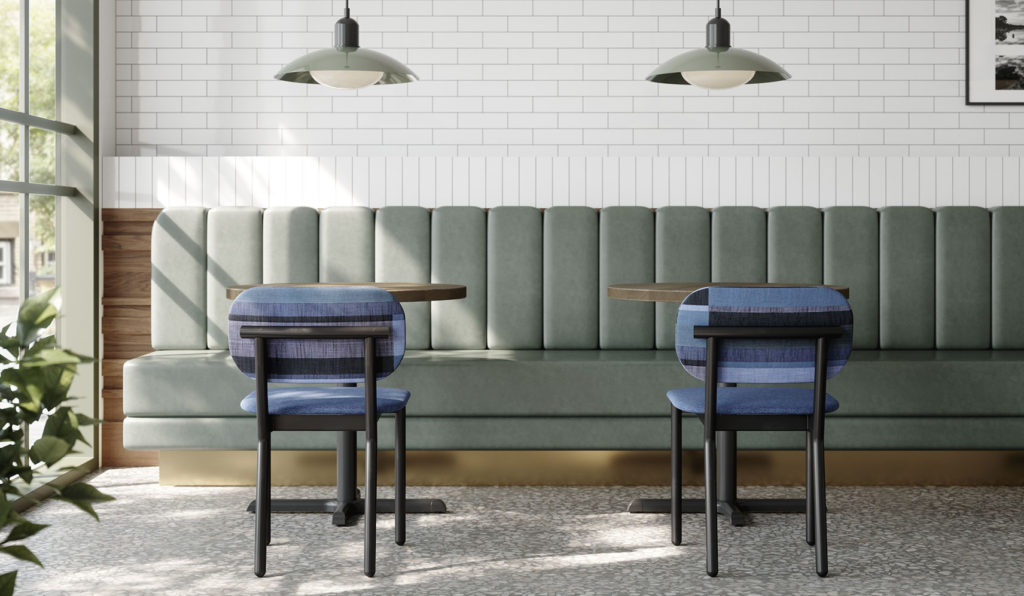 Modern Commercial Dining Chair in Black and Blue Upholstery inside of CAfe