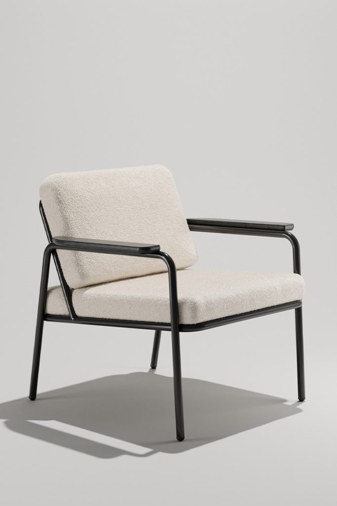 Rita Lounge Chair with grey upholstery, black frame, and wood armcaps