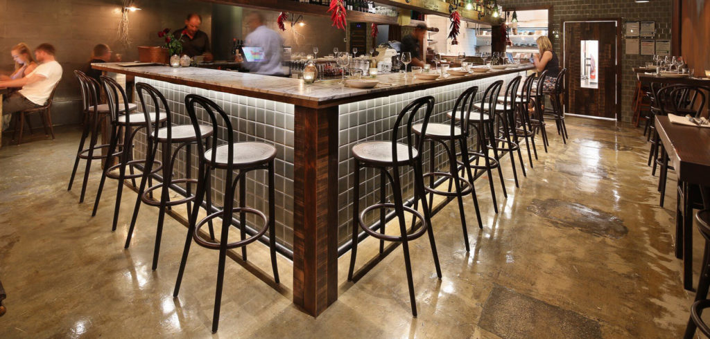 Bentwood barstools at restaurant bar.