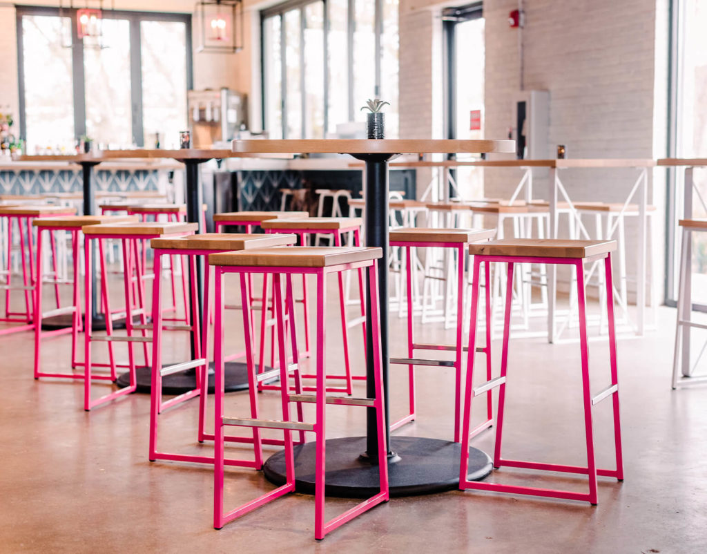 Brady backless stools with pink sled base.