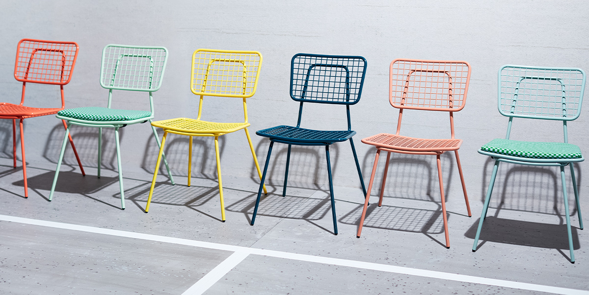 Row of multi colored Hula chairs.