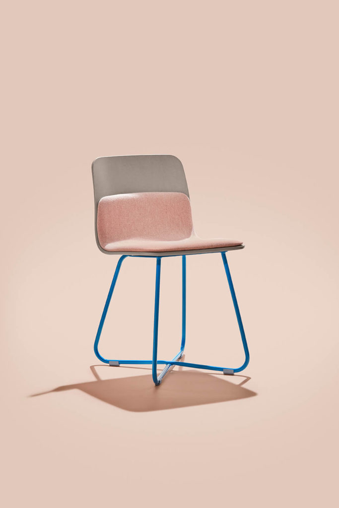 Harper X-Based Chair partially upholstered with blue legs.