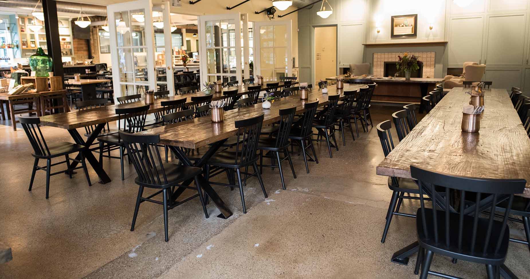 Restaurant with black Hugh chairs.