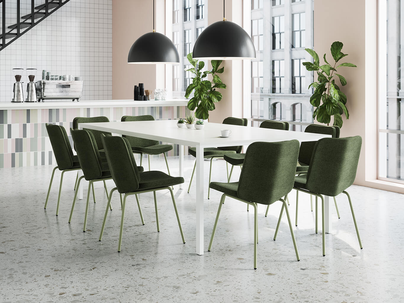 Collaborative space with green upholstered Alfred chairs.