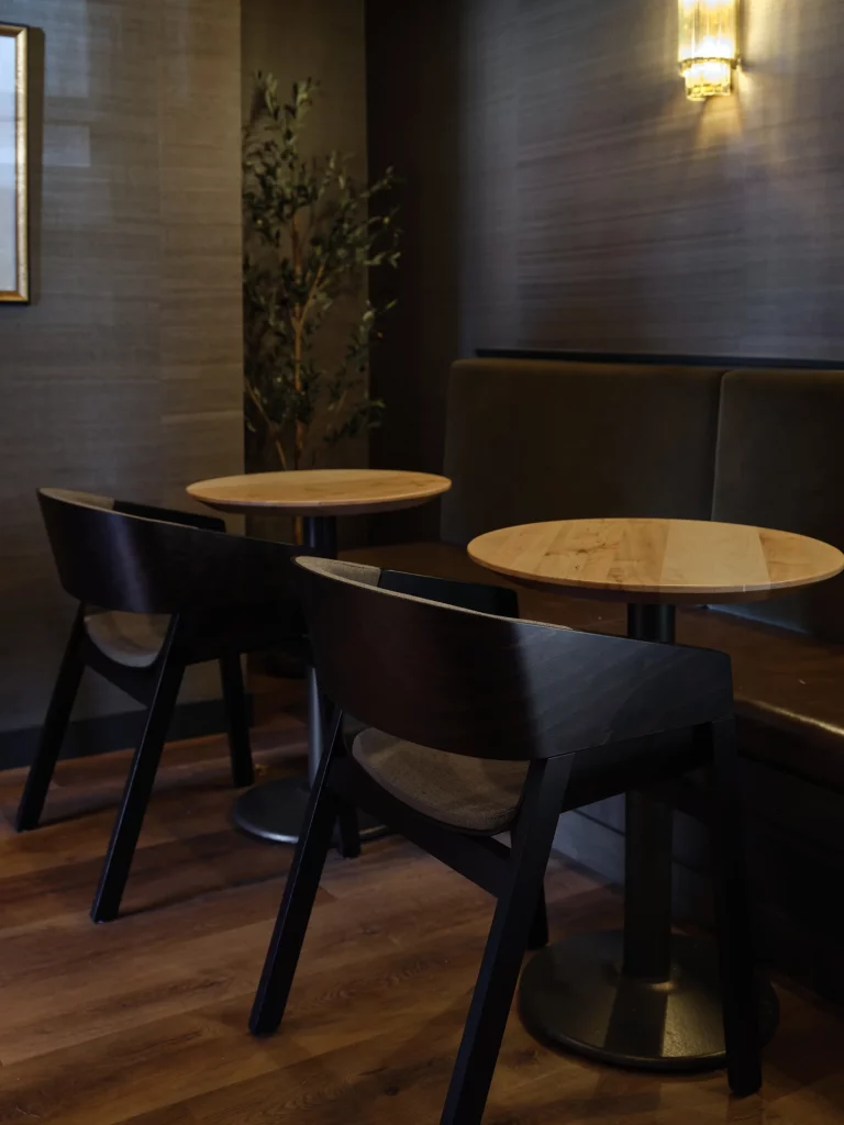 Black Merano Chairs in restaurant.