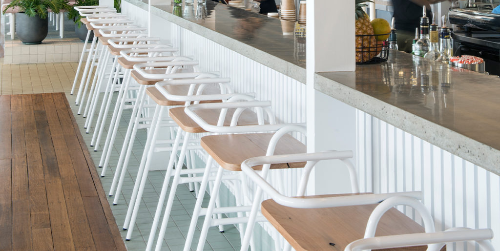 Row of Half Hurdle Stools with white frames.