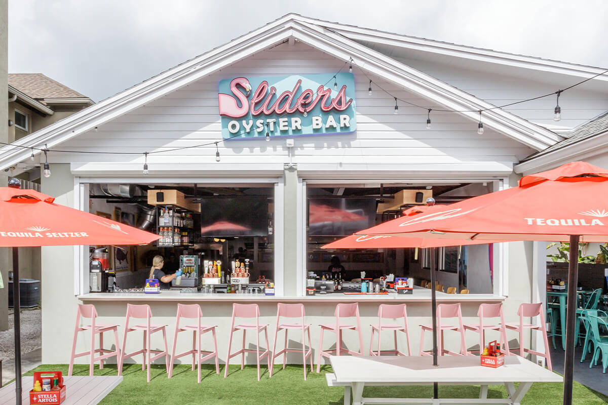 Exterior of Sliders Oyster Bar with Sadie II Barstools.