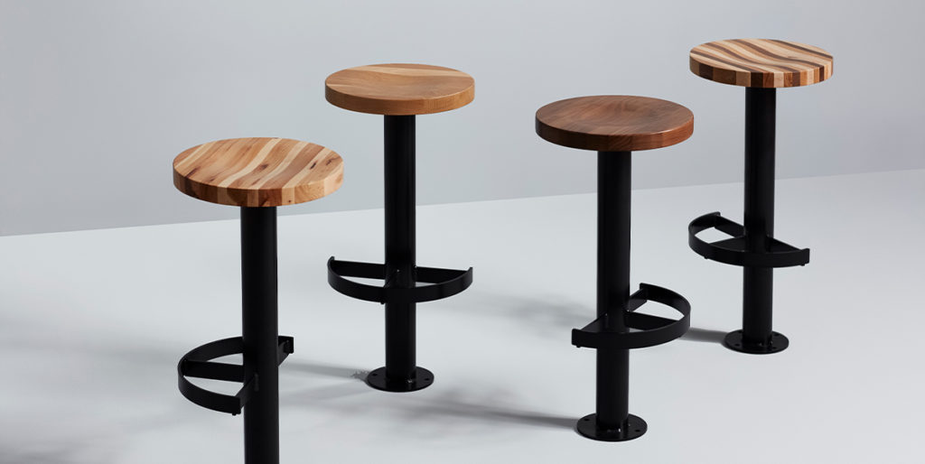 Sally Bolt Down Stools with wood seats.