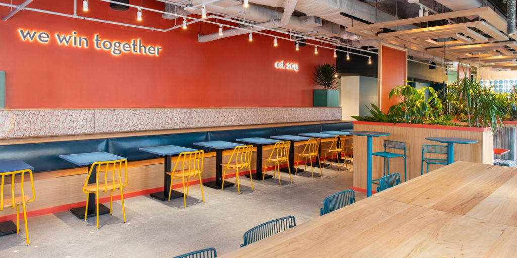 Colorful office break room featuring Leo Chairs