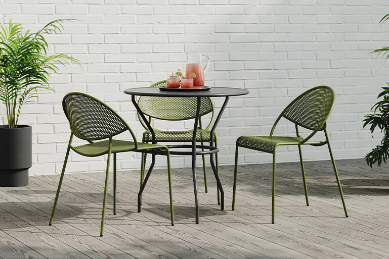 Hula Outdoor Chairs in green with Opla Table.