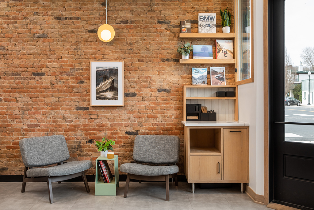 A cozy cafe nook featuring the Andy Lounge Chair