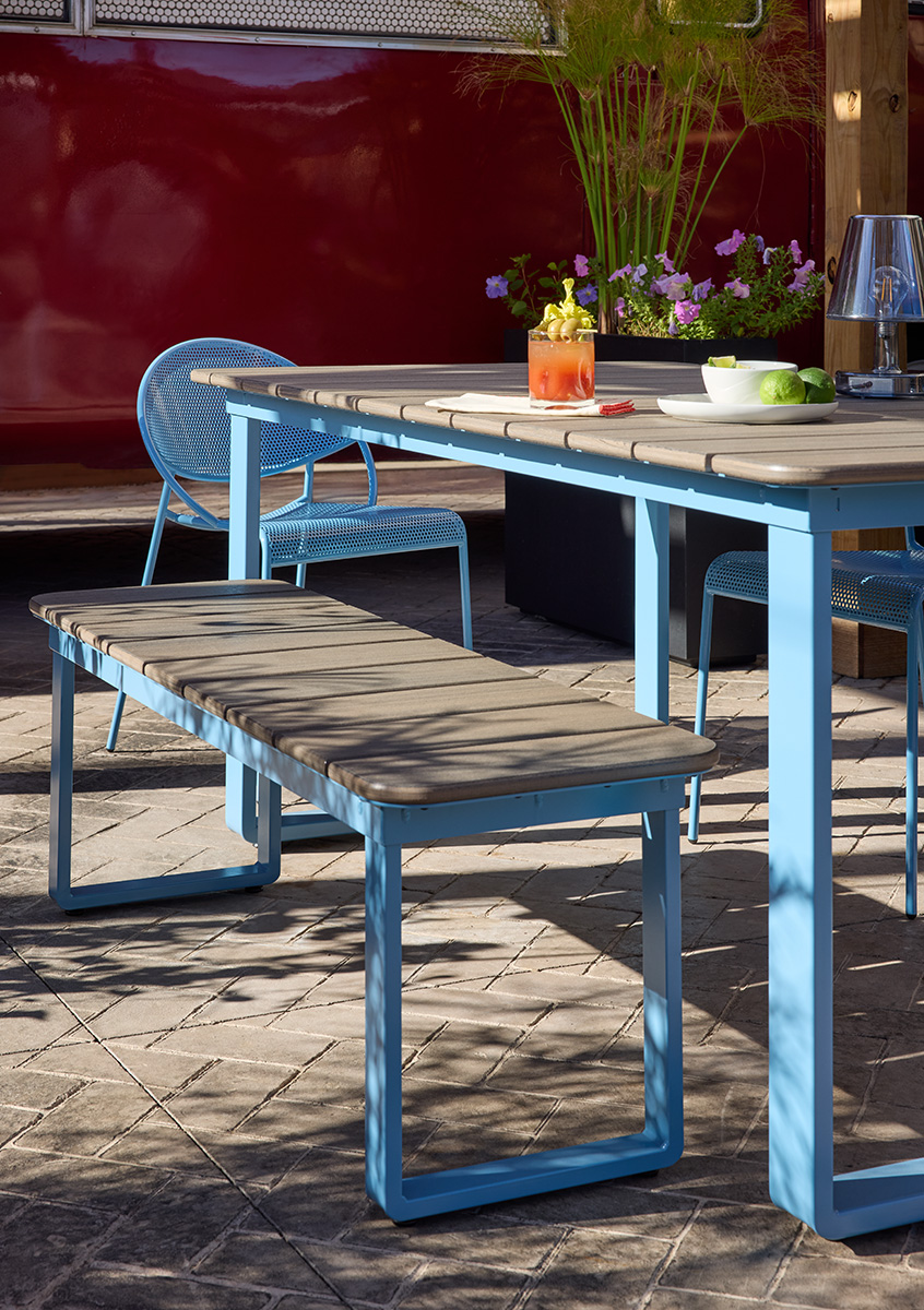 Bowen Communal Table and Bench with pastel blue bases and HDPE surfaces on