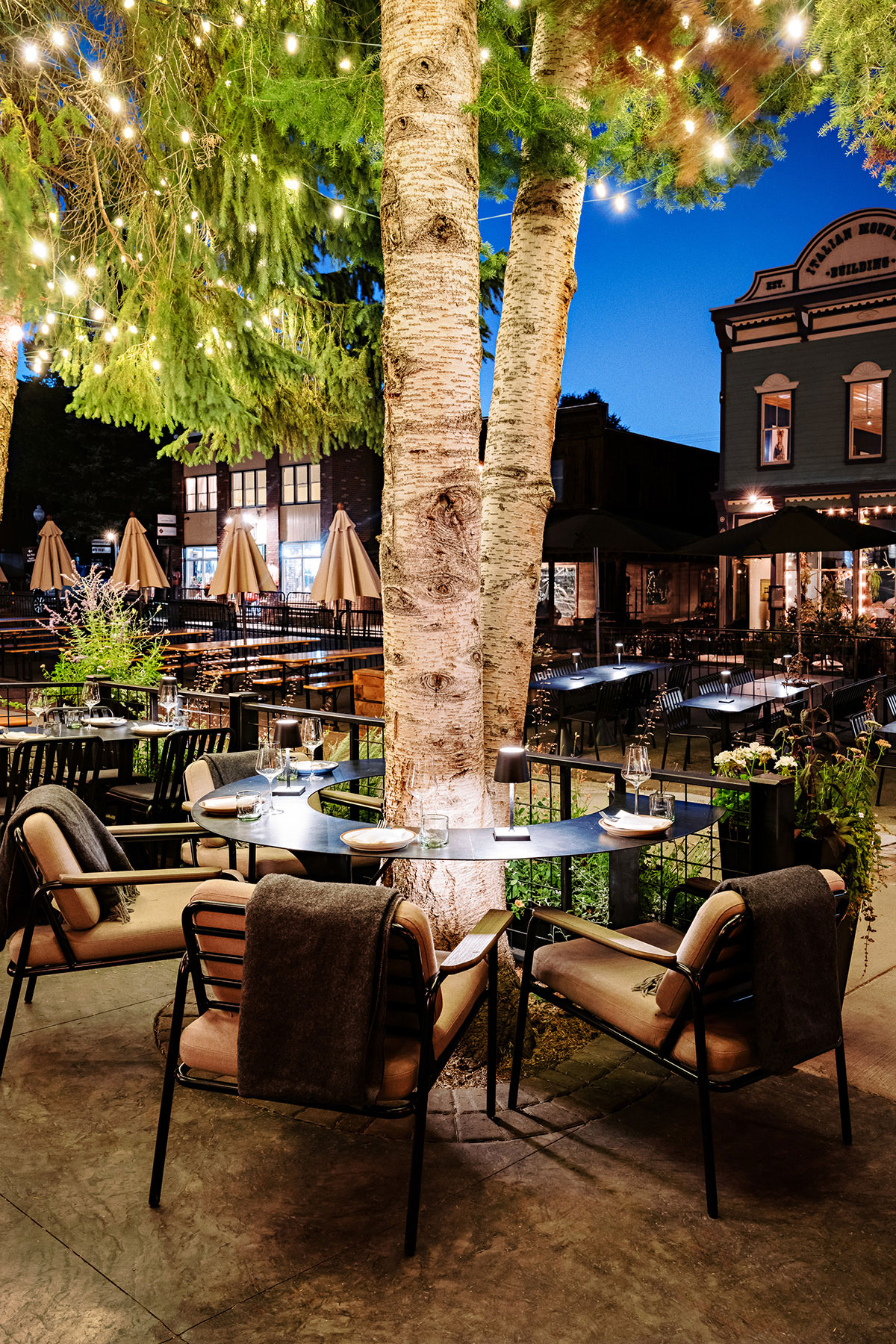two-twelve-restaurant-patio-outdoor-rita-lounge-chair-night-biophilia