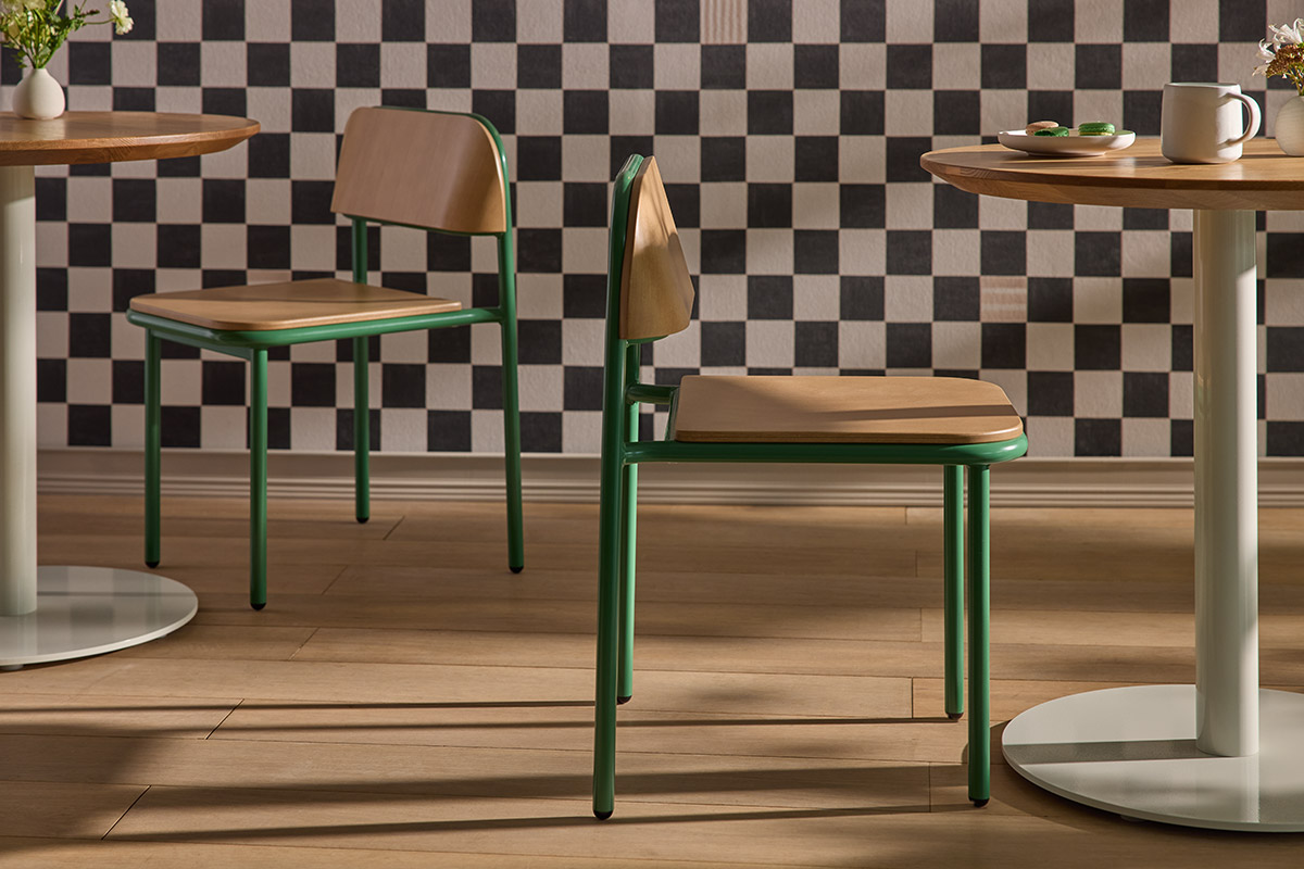 green-nora-chair-onesima-pedestal-table-checkered-wallpaper