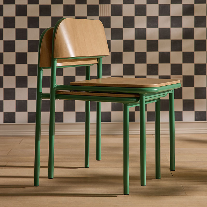green-nora-chair-stack-detail-honey-wood-sq green-nora-chair-stack-detail-honey-wood-sq