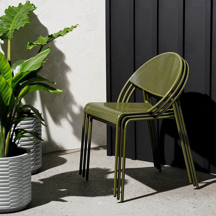 Stacked Hula chairs in olive green finish.